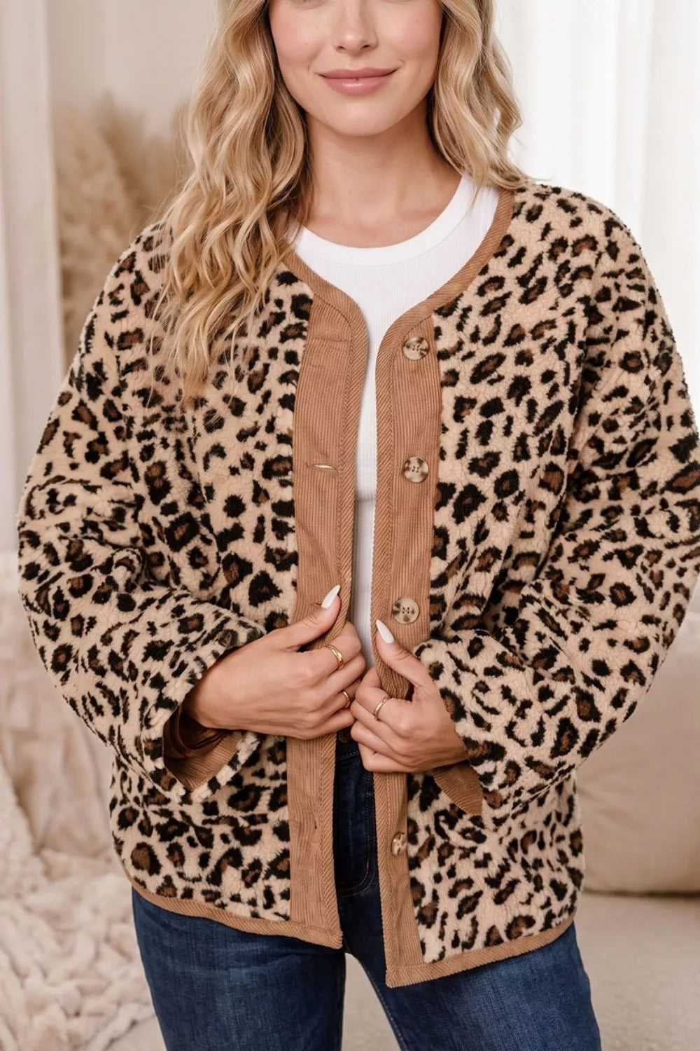 Leopard plush jacket with brown corduroy trim, front styled view