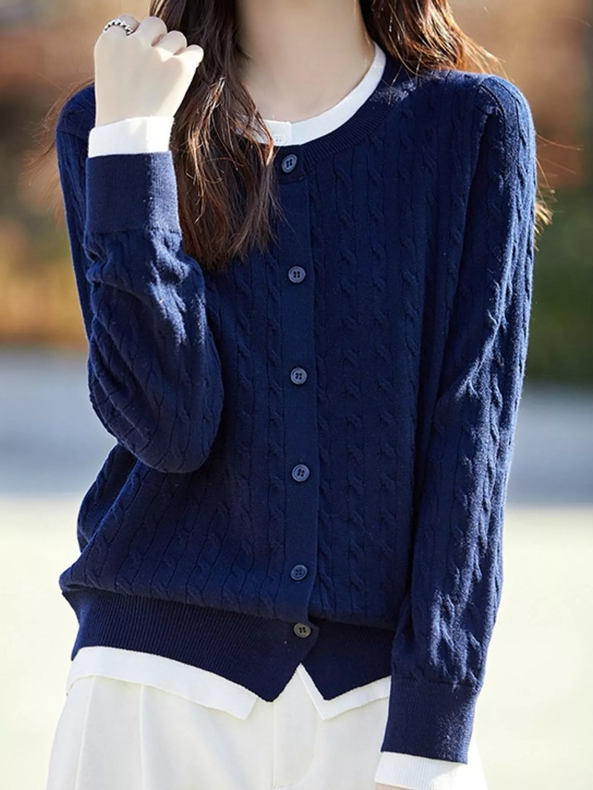 Navy cable-knit button-down cardigan
