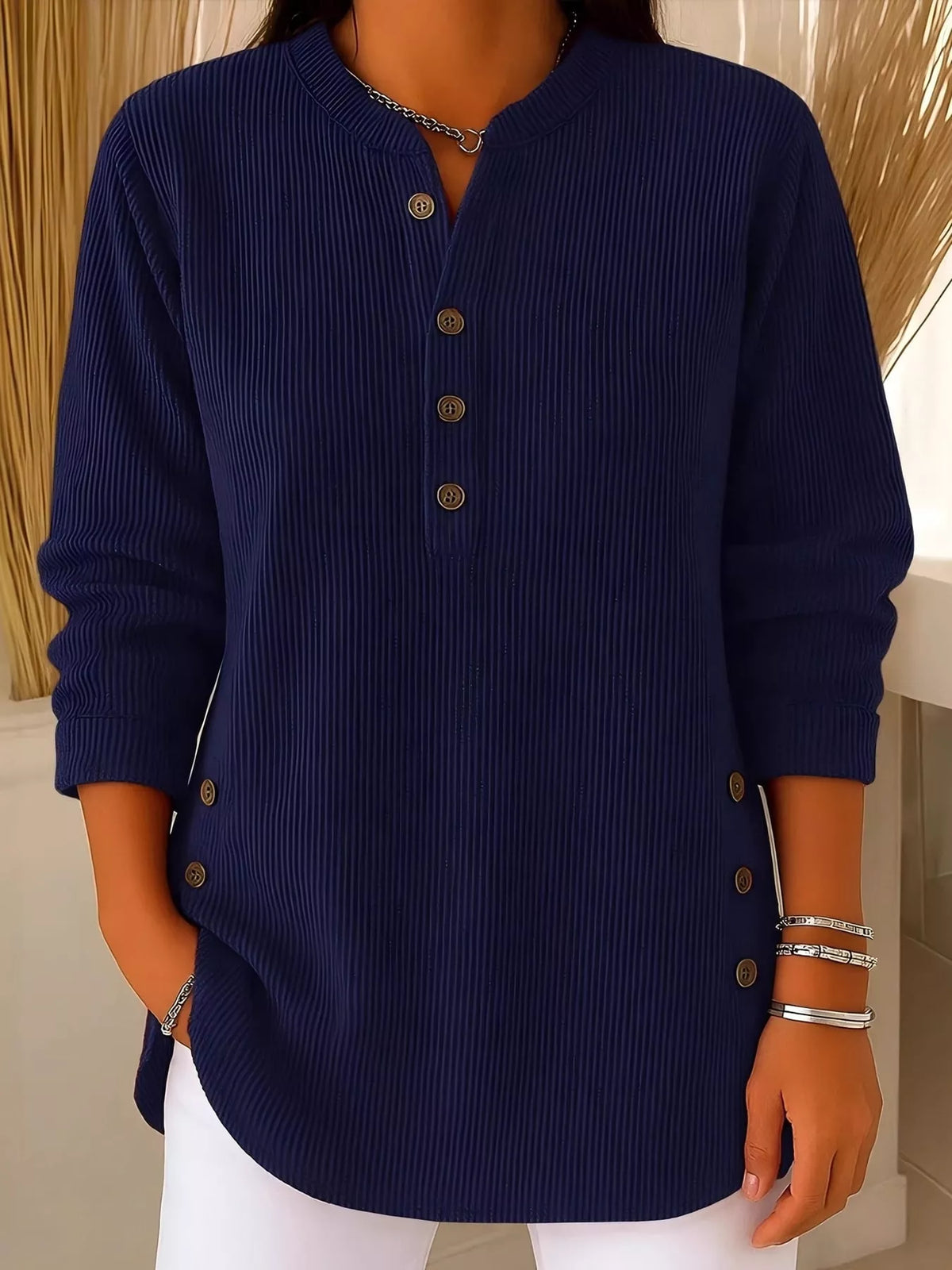 Navy button detail long sleeve top, front view
