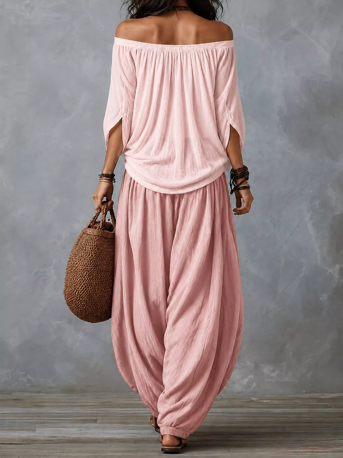 Pink off-shoulder top and wide-leg harem pants set — back view