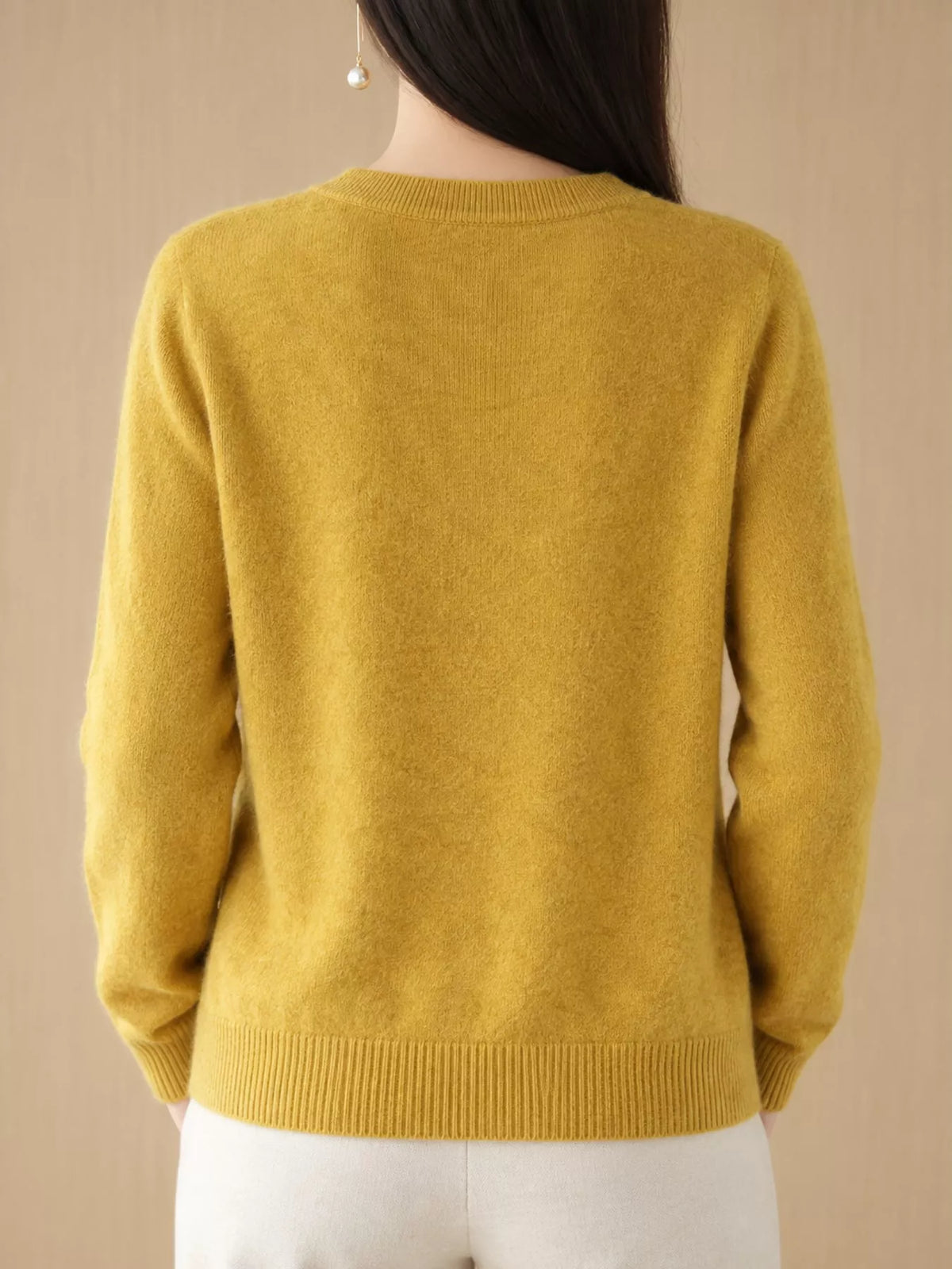 Mustard crew neck button-front cardigan, back view