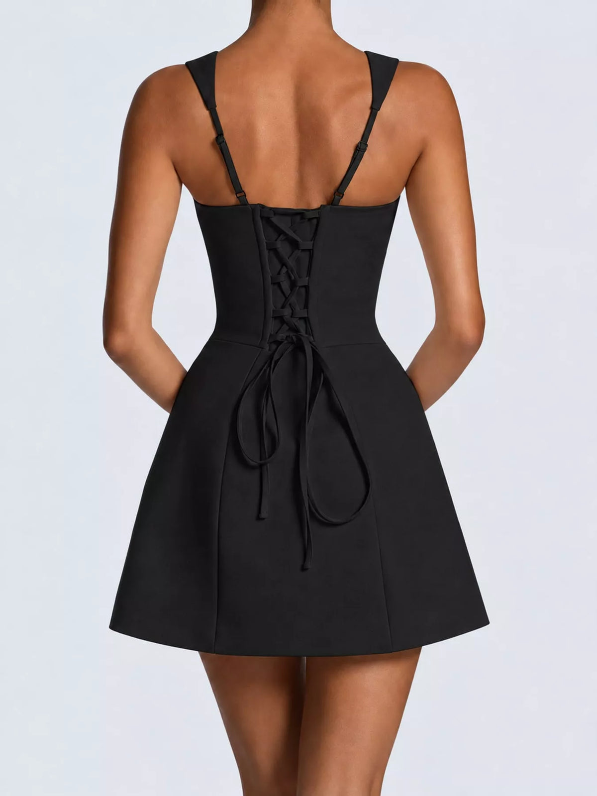 Black square-neck sleeveless mini dress, back view