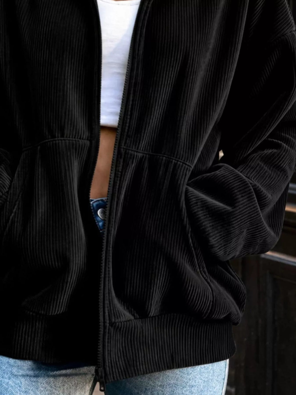 Black corduroy zip-up jacket, patch pocket and cuff detail