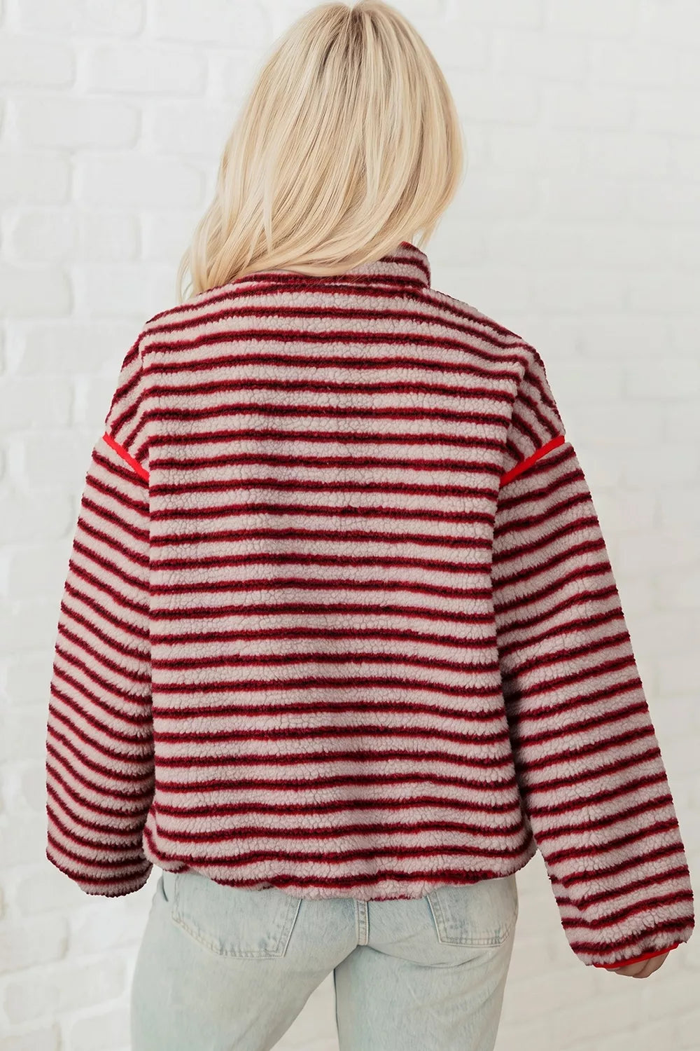 Red and cream striped fuzzy snap-placket sweatshirt, back view
