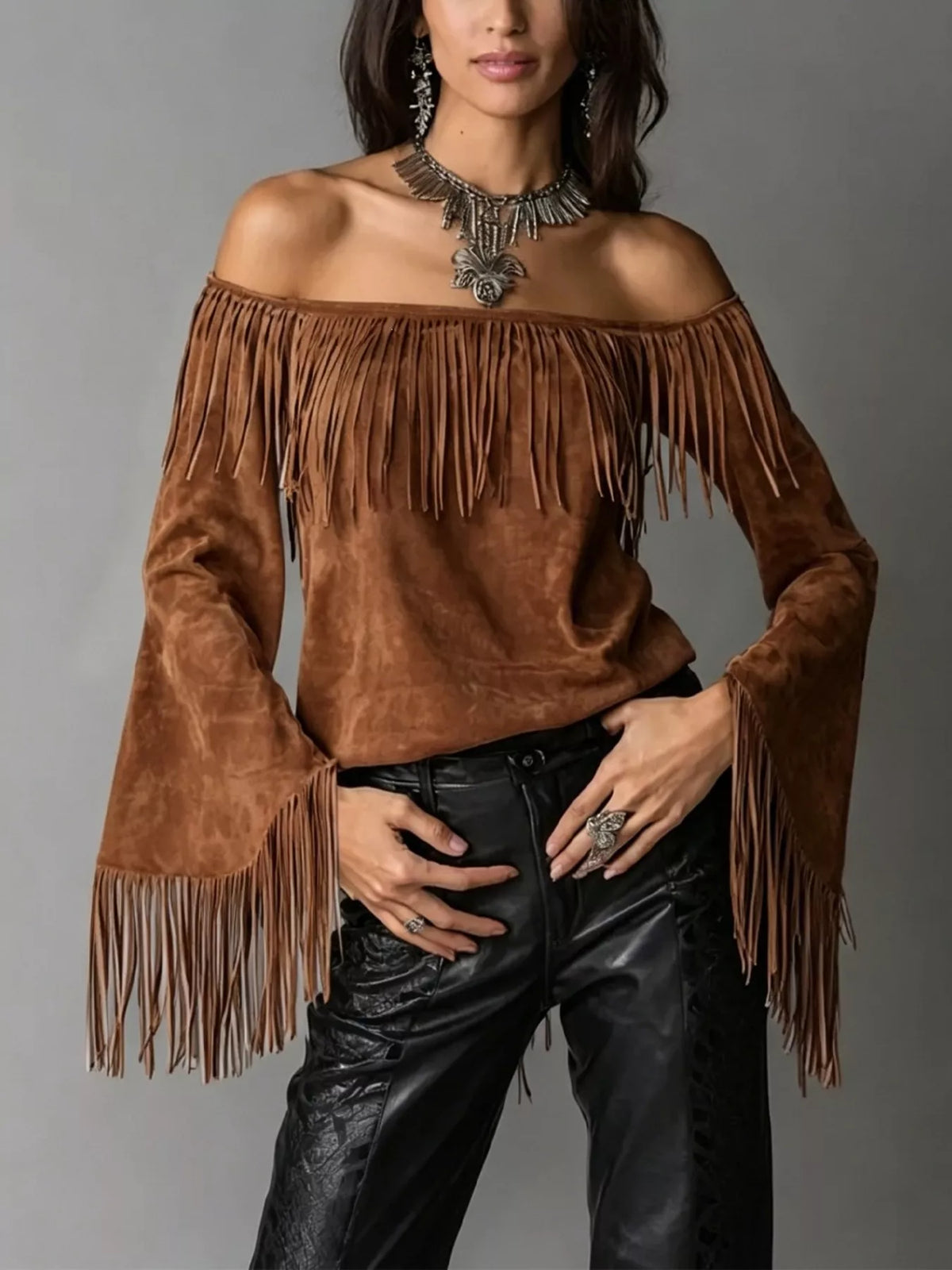 Off-shoulder faux suede fringe top in brown, front view
