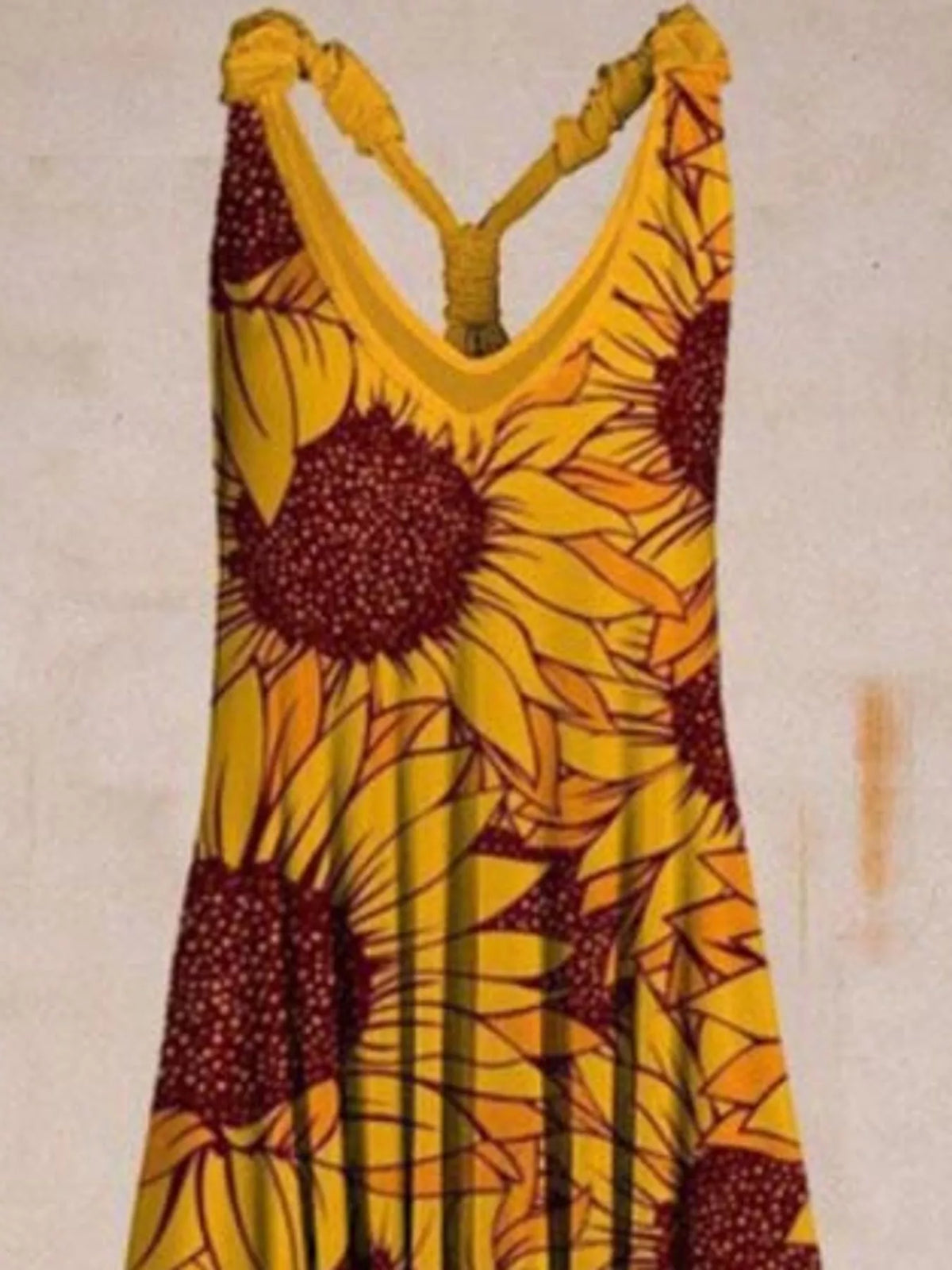 Yellow sunflower-print V-neck sleeveless jumpsuit, neckline and strap detail