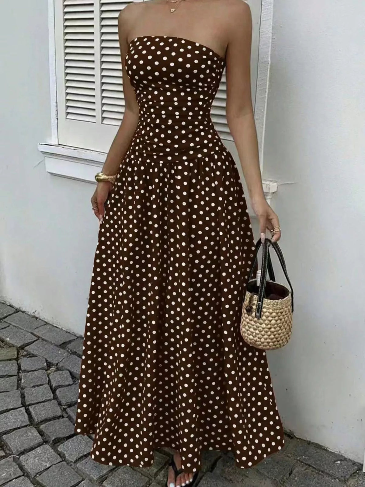 Women's Strapless Polka Dot Ruched Maxi Dress in brown dots — front view