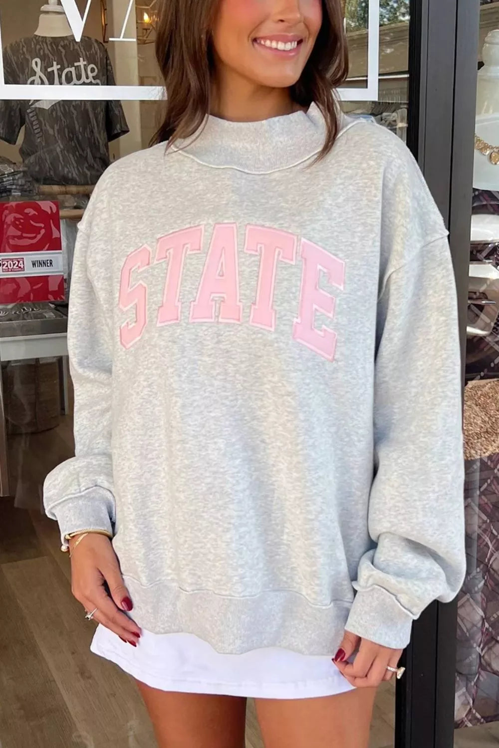 STATE Graphic Exposed Seam Mock Neck Sweatshirt in gray, front view