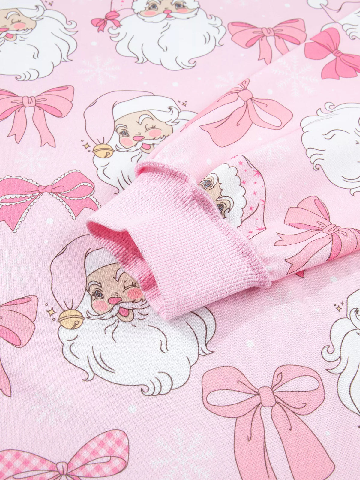 Santa-and-bow sweatshirt, cuff detail
