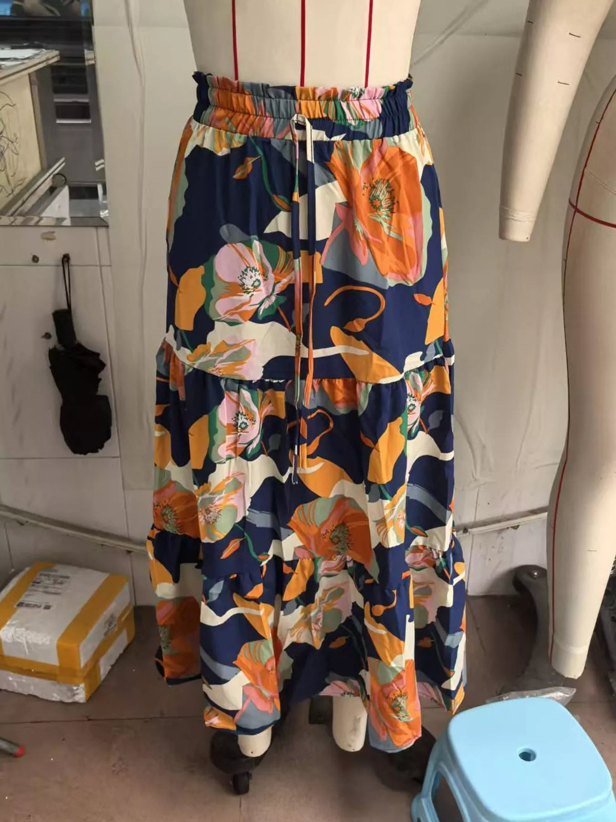 Navy floral drawstring tiered skirt — front view