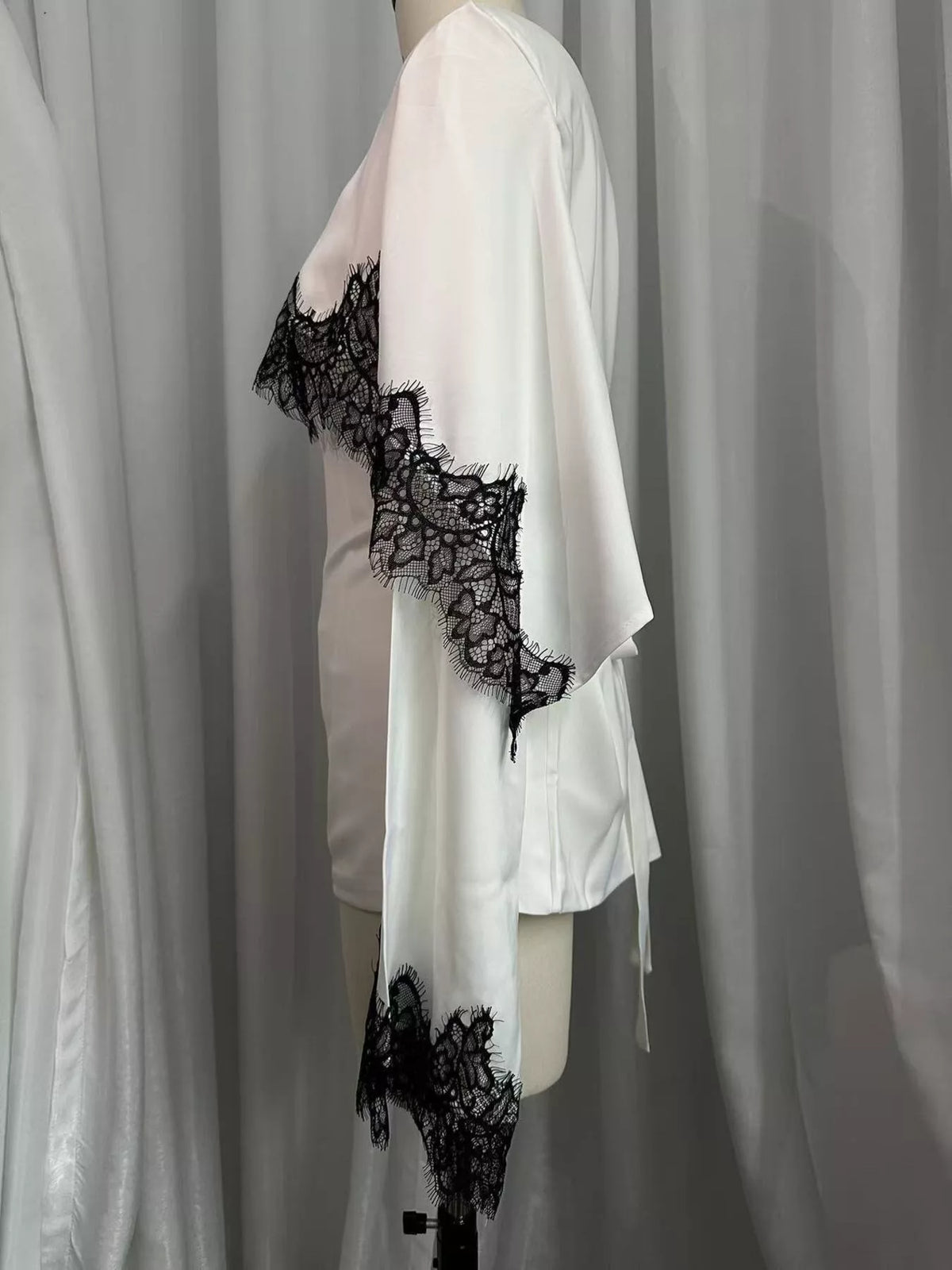 Round neck long sleeve blouse, side view