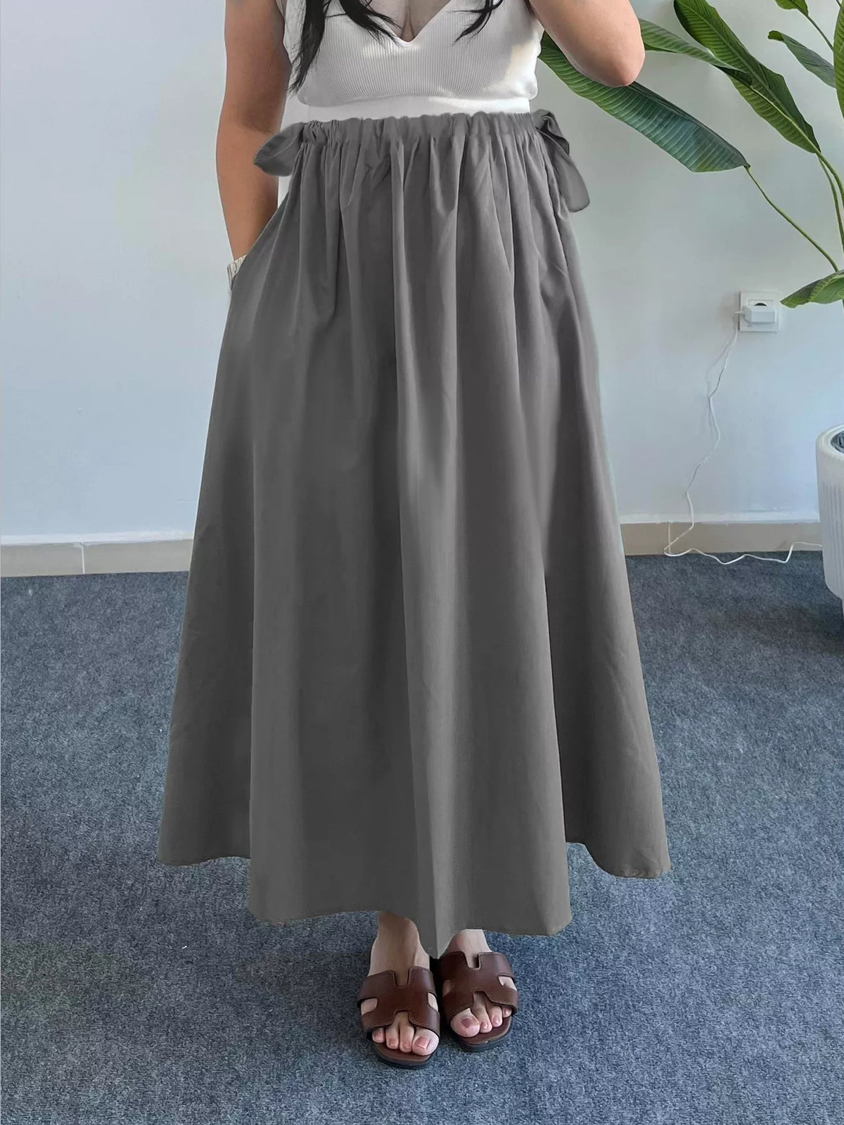 Trendsi Flowy A-Line Midi Skirt with Pockets -