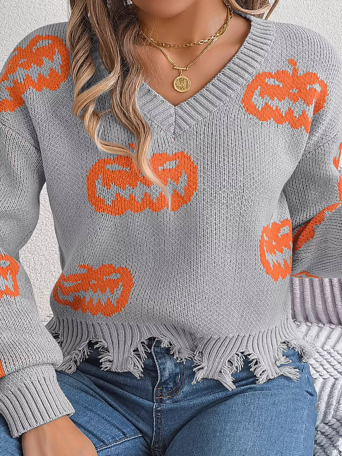 Pumpkin Distressed Hem Sweater in gray, front view