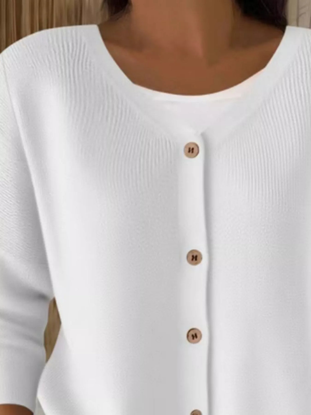 White ribbed button-front cardigan, neckline close-up
