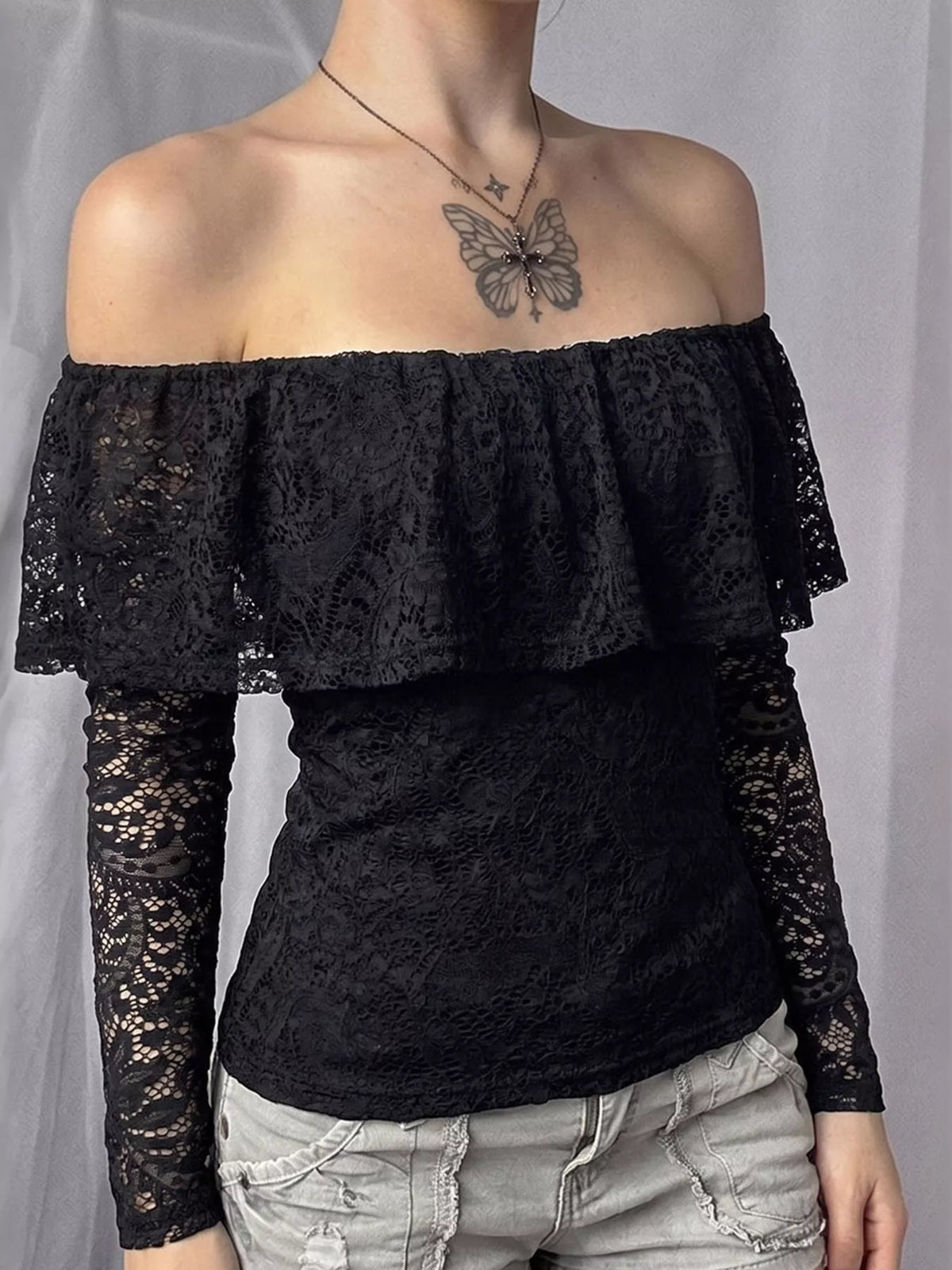 Off-Shoulder Lace Flounce Long-Sleeve Top in black, front view