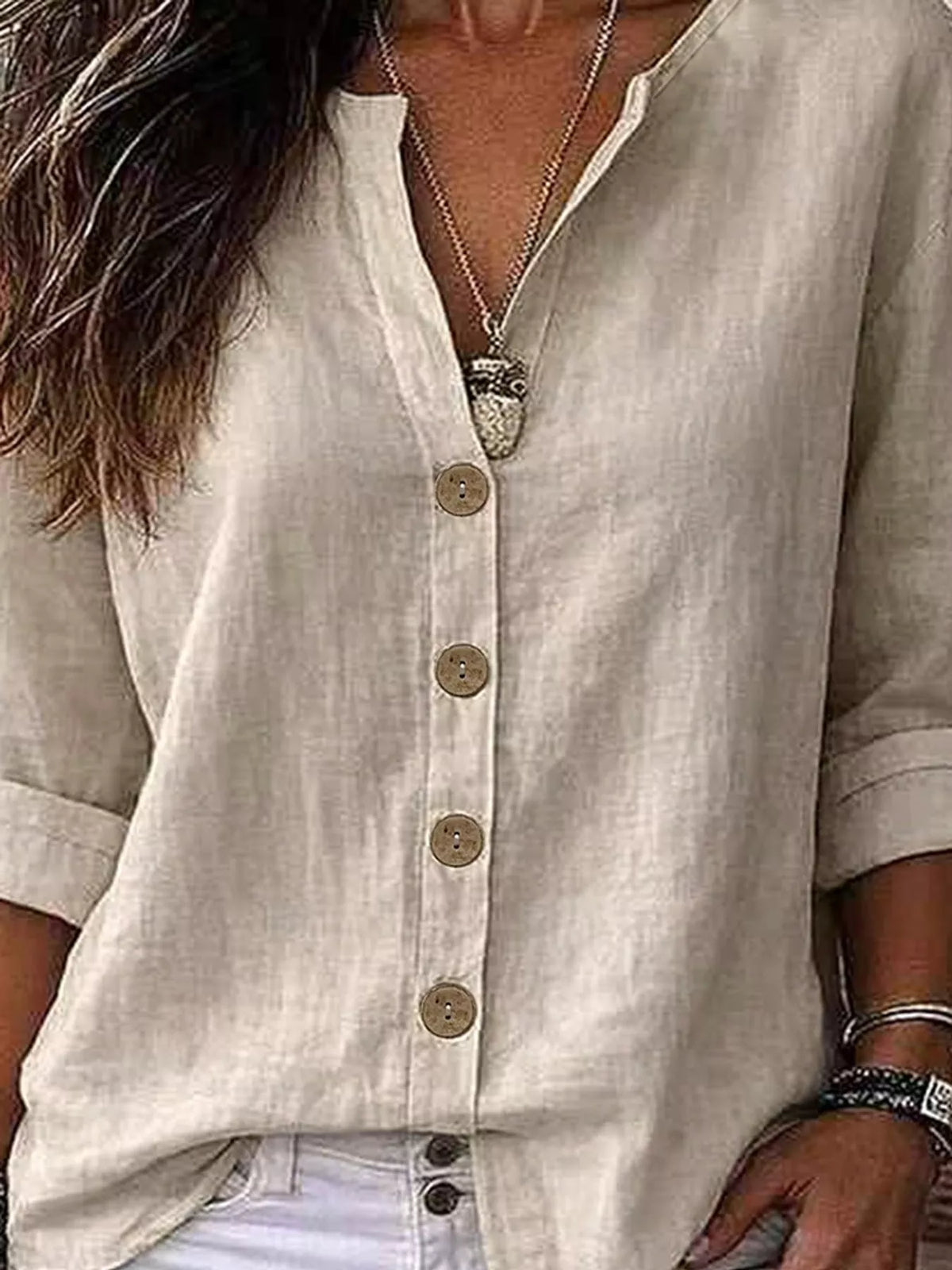 Notched-neck shirt, cream buttons front