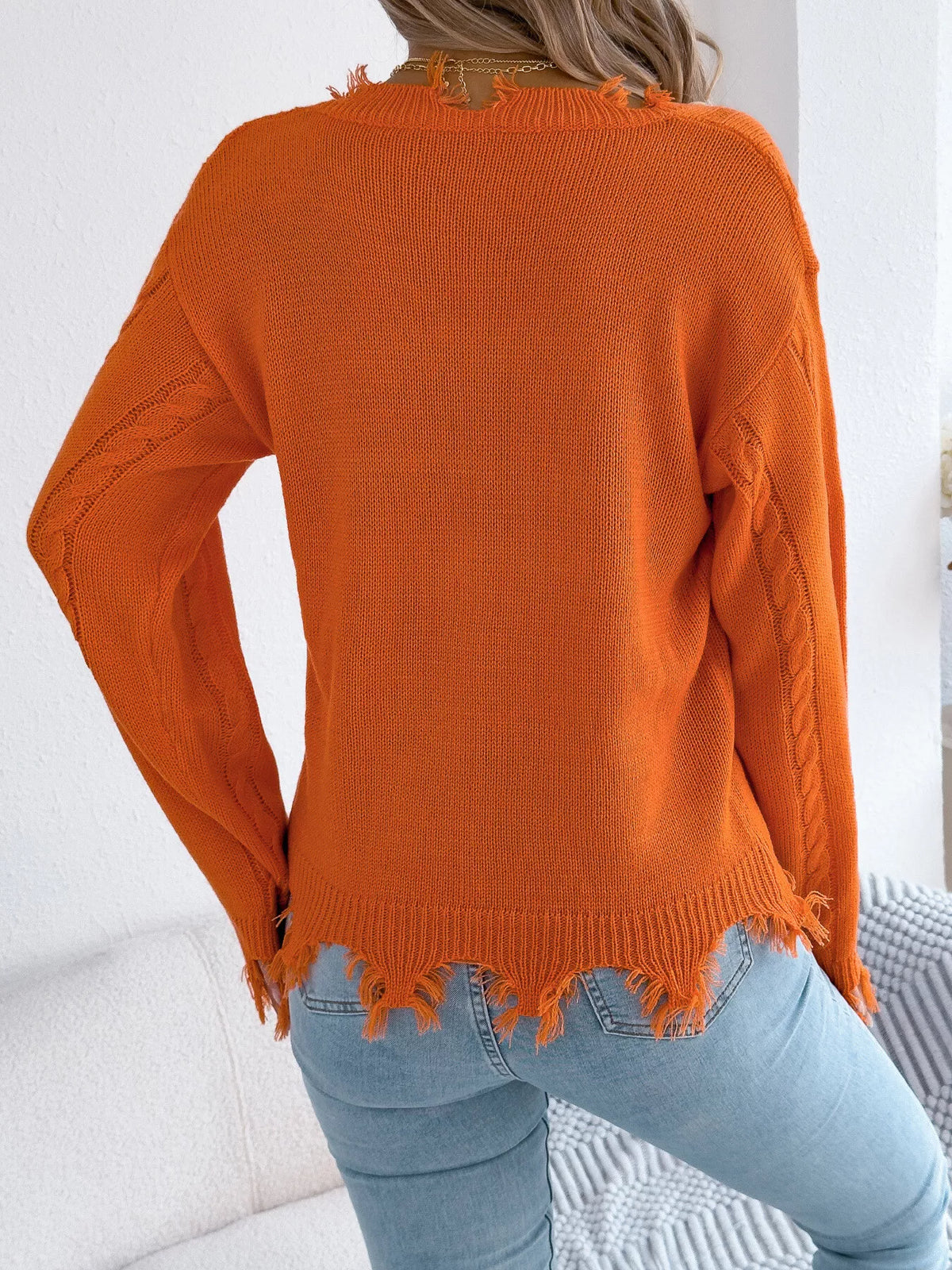 V-Neck Distressed Hem Cable Knit Sweater in orange, back view