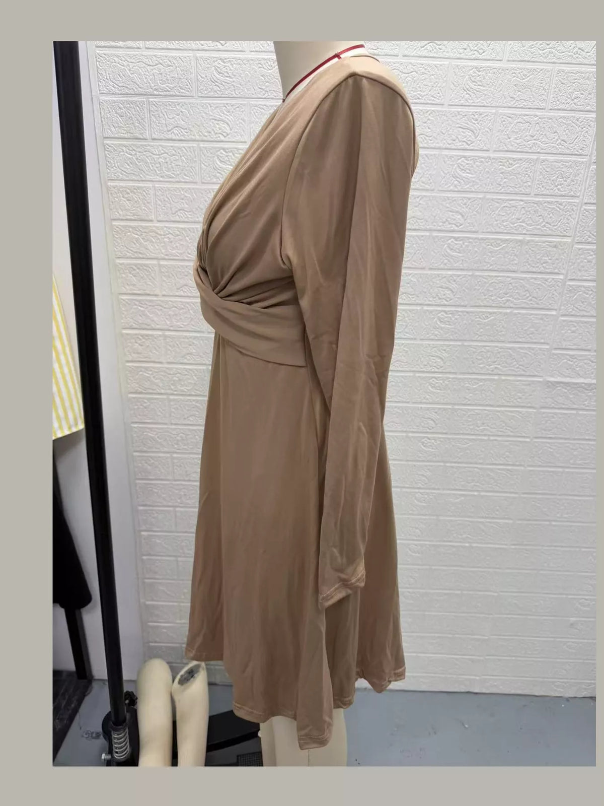 Camel long sleeve ruched-front midi dress, side view