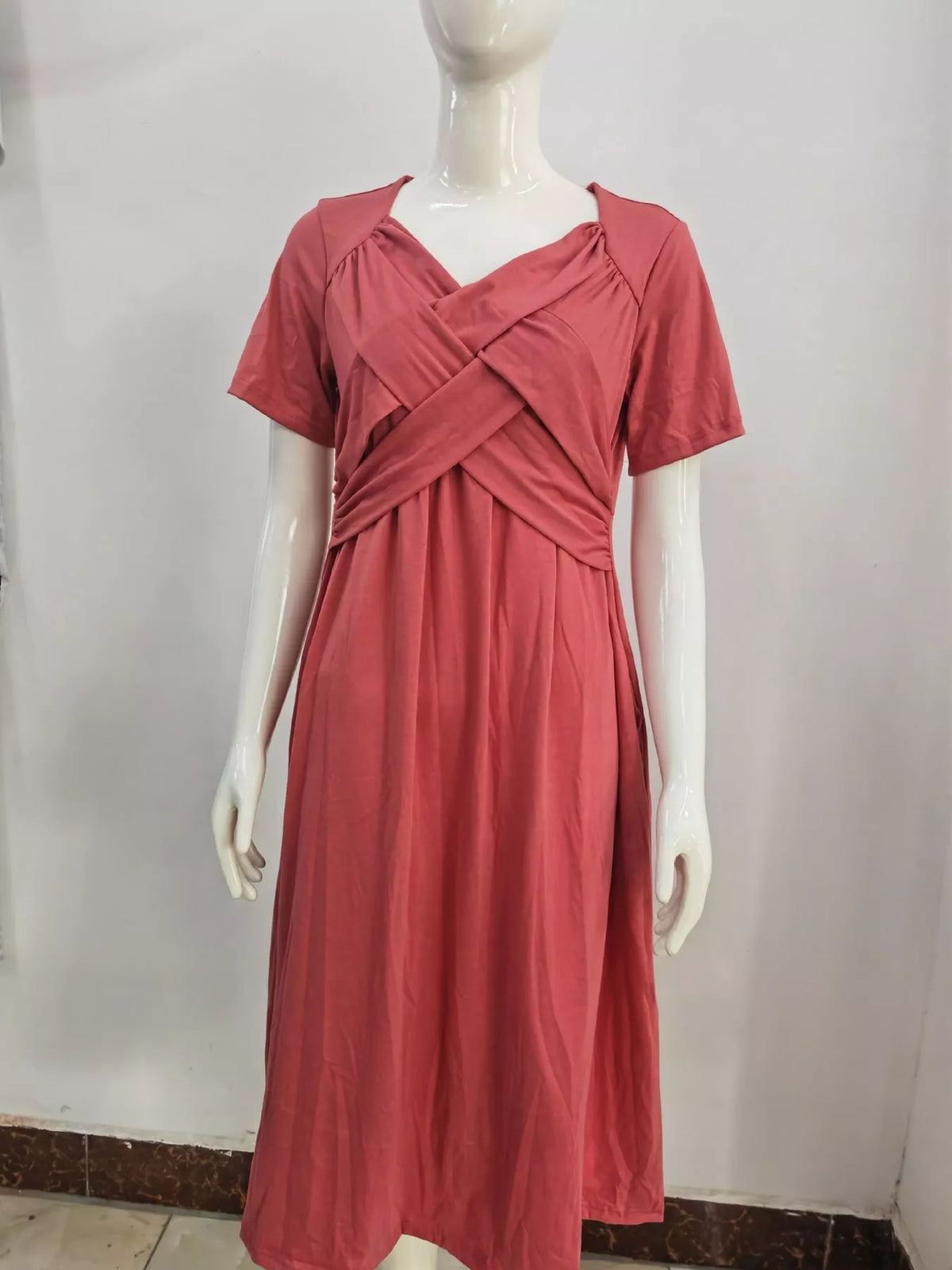 Pink crisscross short sleeve midi dress, front view
