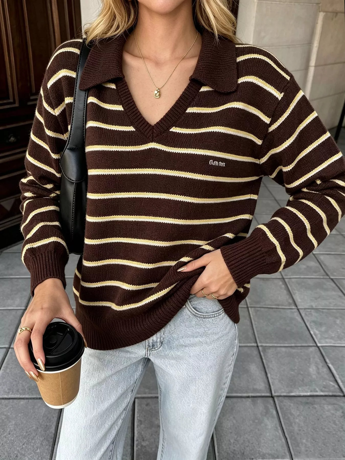 Brown and cream striped polo-collar sweater, front view.