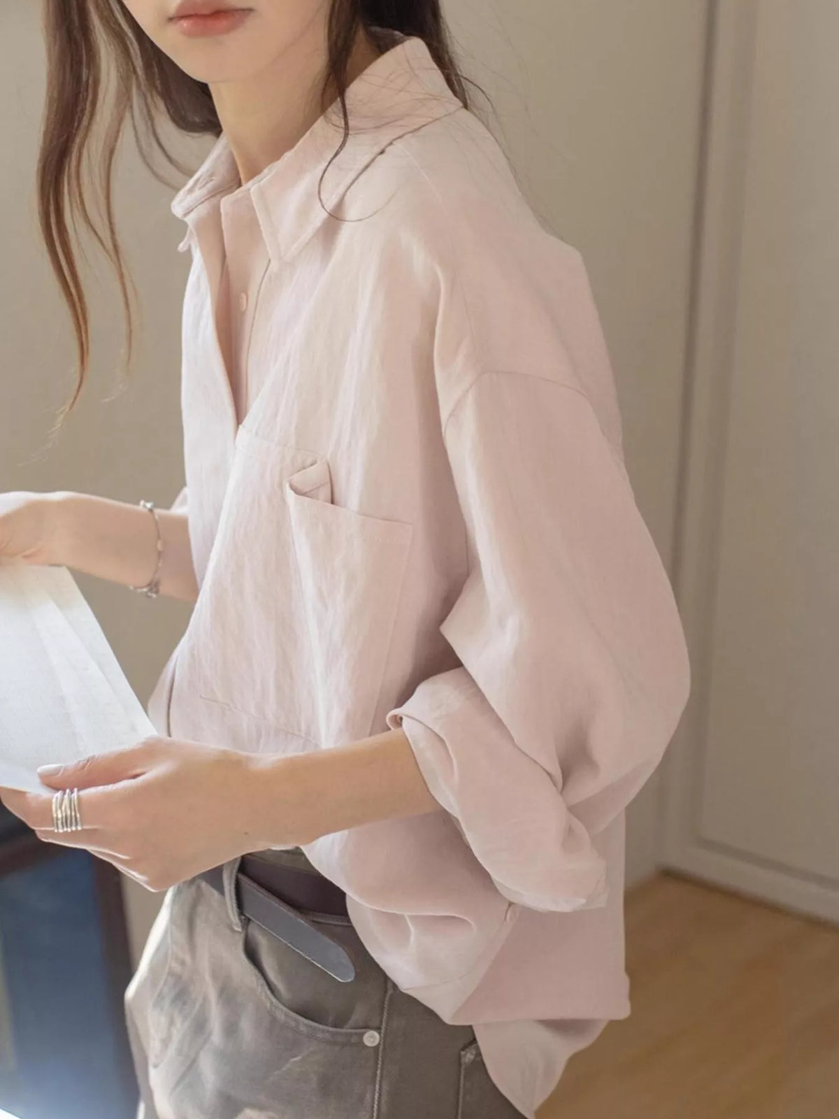 Pink button down long sleeve shirt, front view