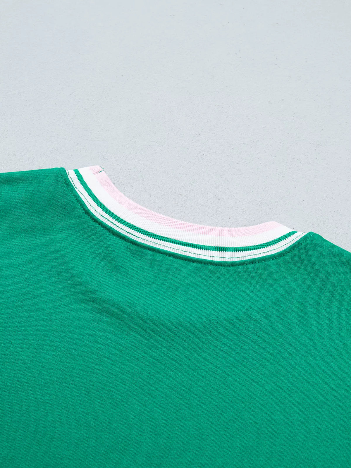 Green sweatshirt with contrast striped ribbed trim, back neckline detail