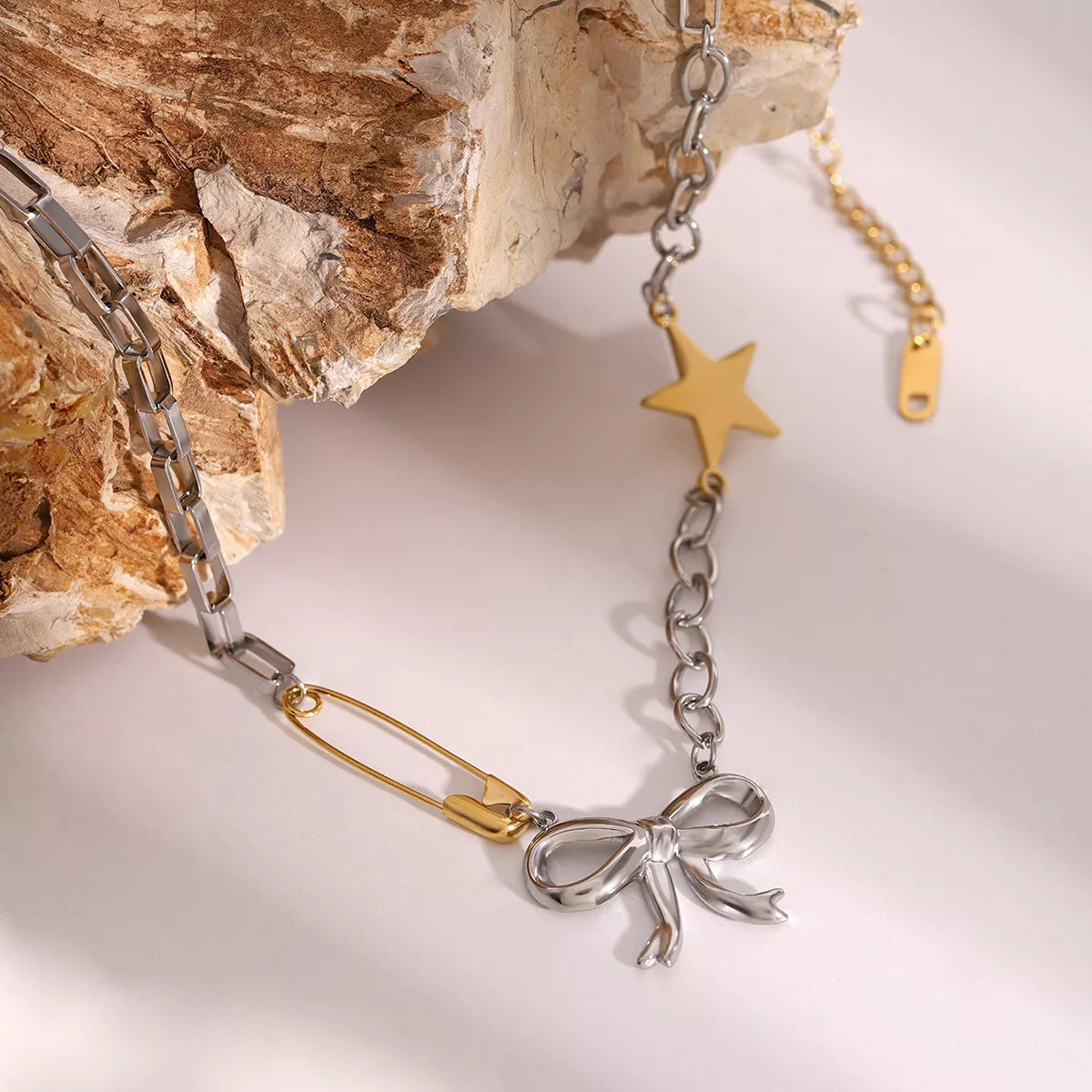 Trendsi Two-Tone Bow Star Necklace -