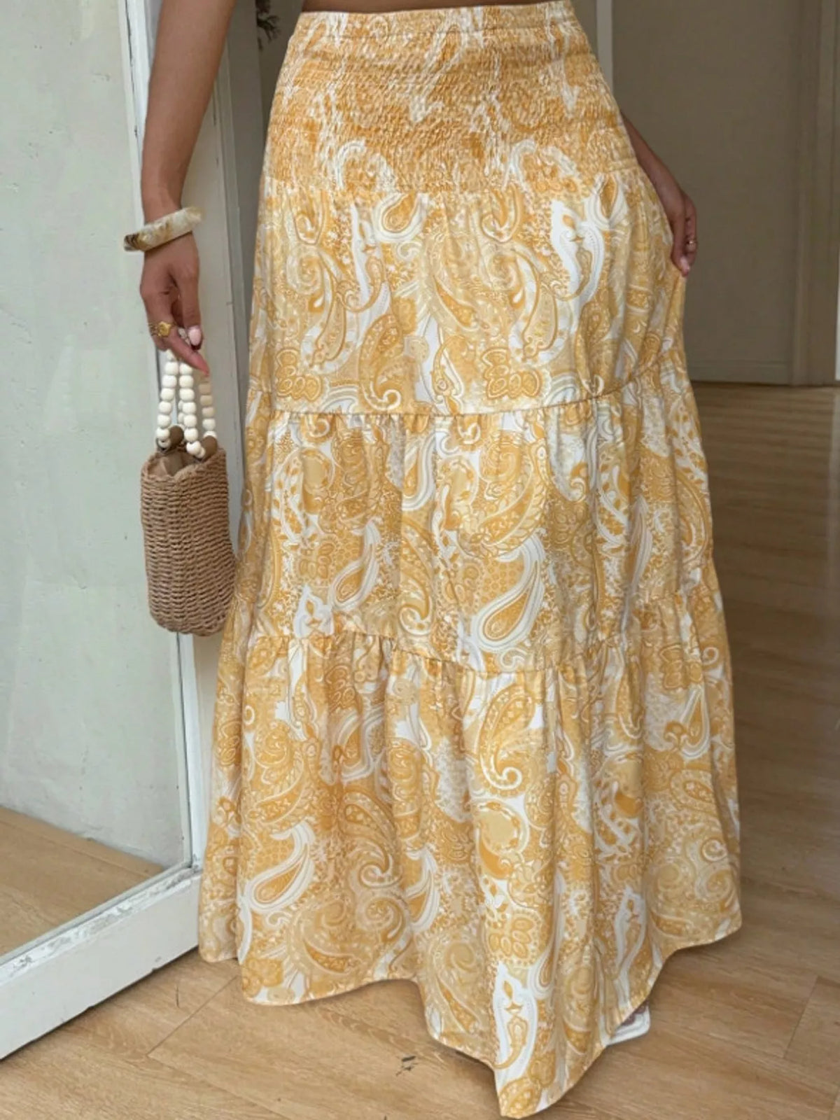 Women's Paisley Print Tiered Maxi Skirt in yellow — front view