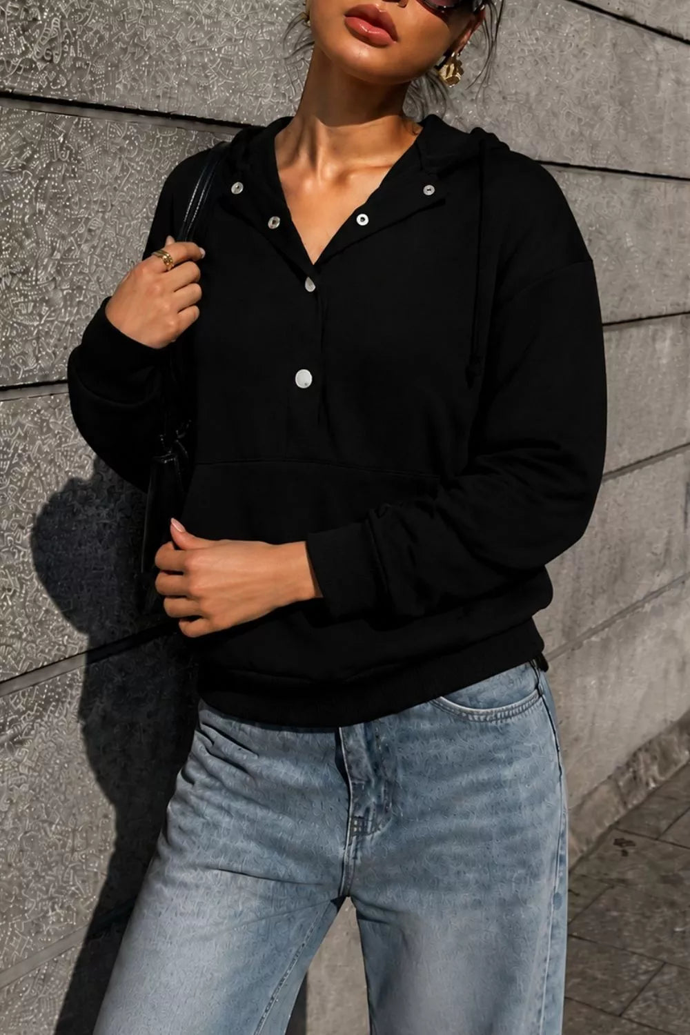 Women's Half Snap Kangaroo Pocket Hoodie in Black, front view