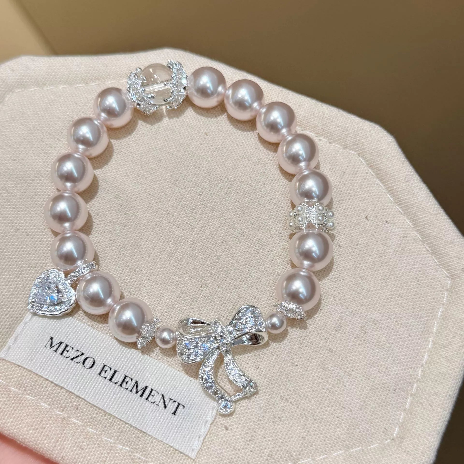 Trendsi Pearl Bracelet with Bow Charm -