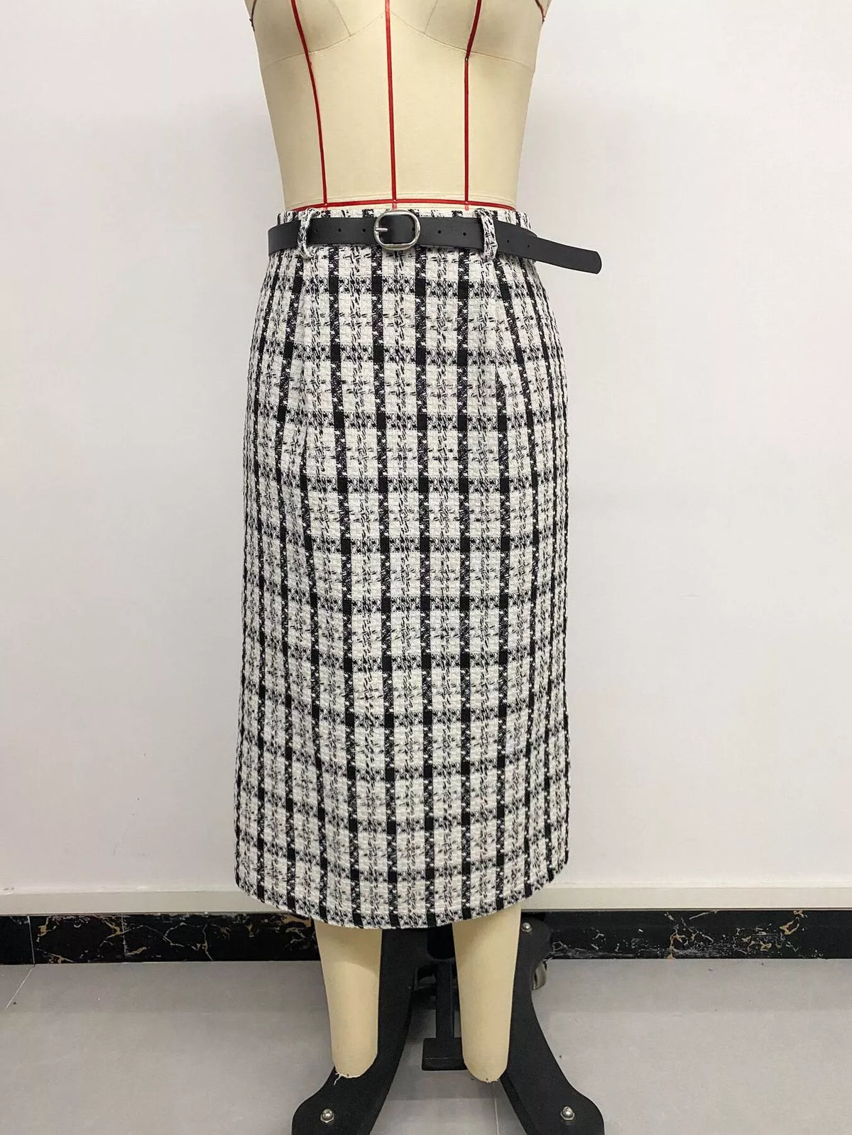Black and white plaid midi skirt, front on mannequin