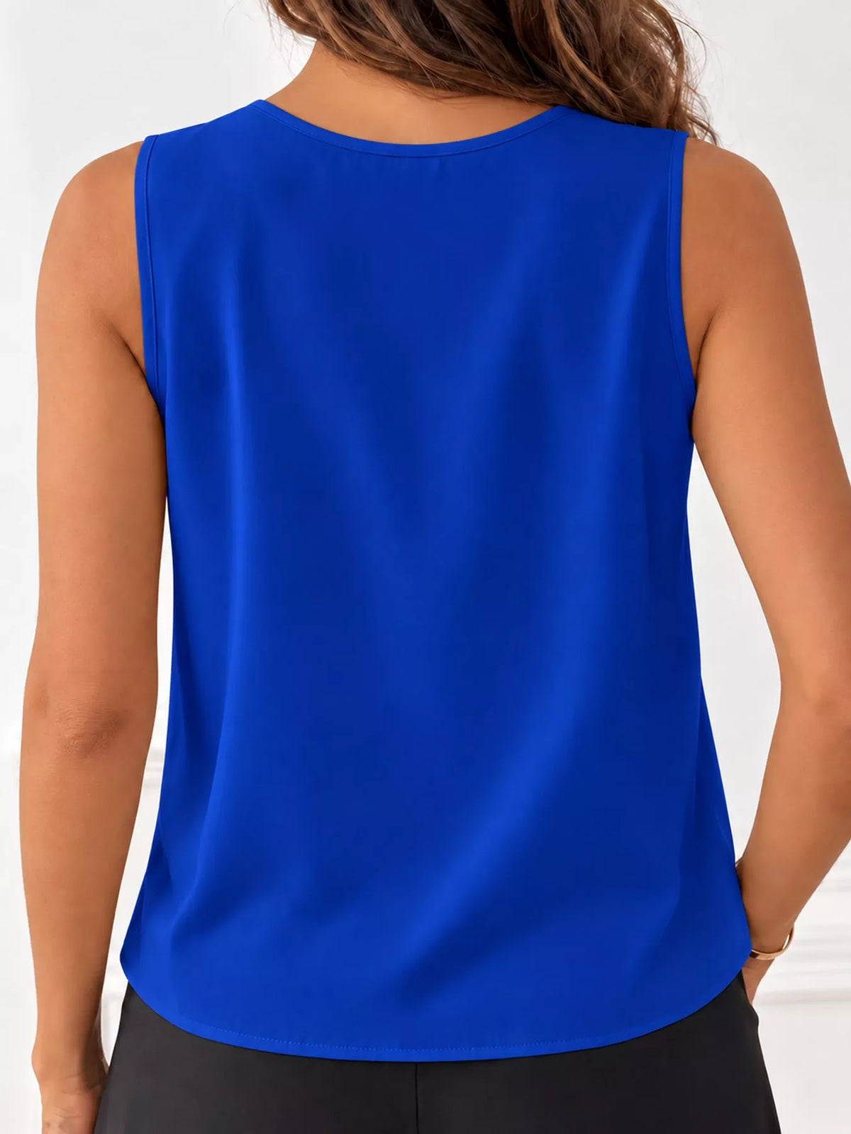 Sleeveless Pleated Blouse — back view