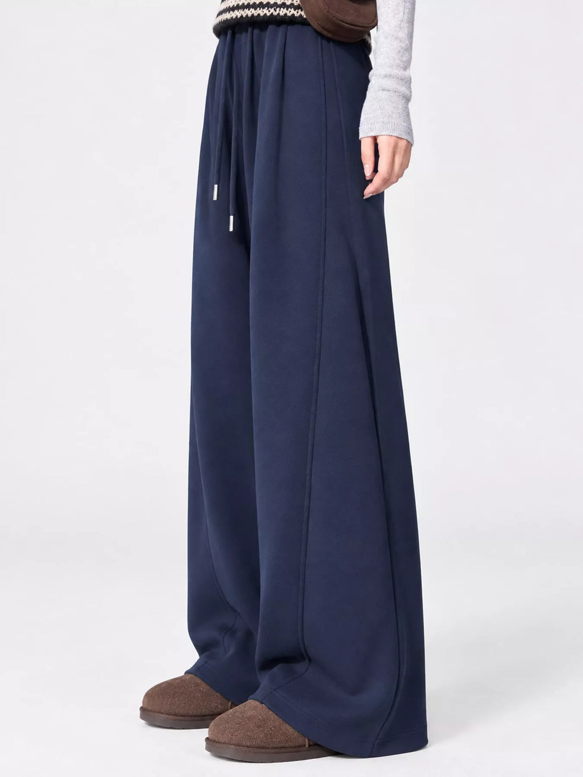 Navy wide leg drawstring sweatpants, side view