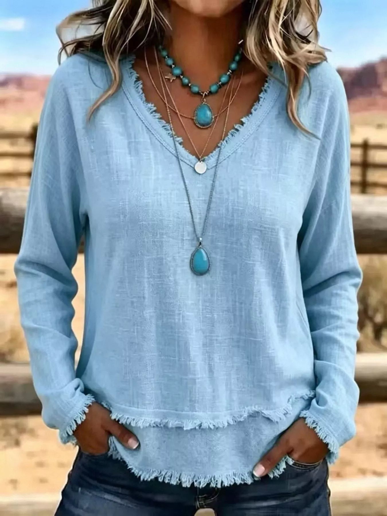 Trendsi V-Neck Long Sleeve Blouse with Frayed Hem Detail -