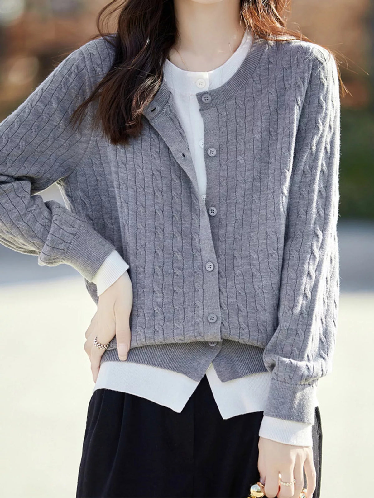 Gray cable-knit button-down cardigan