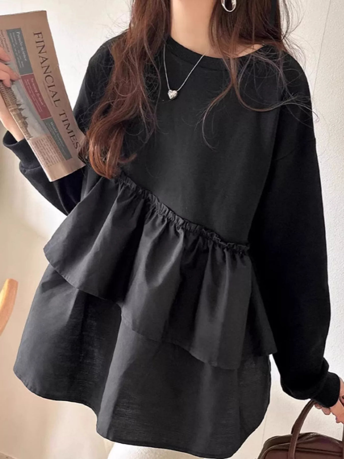 Black color-block ruffled hem top