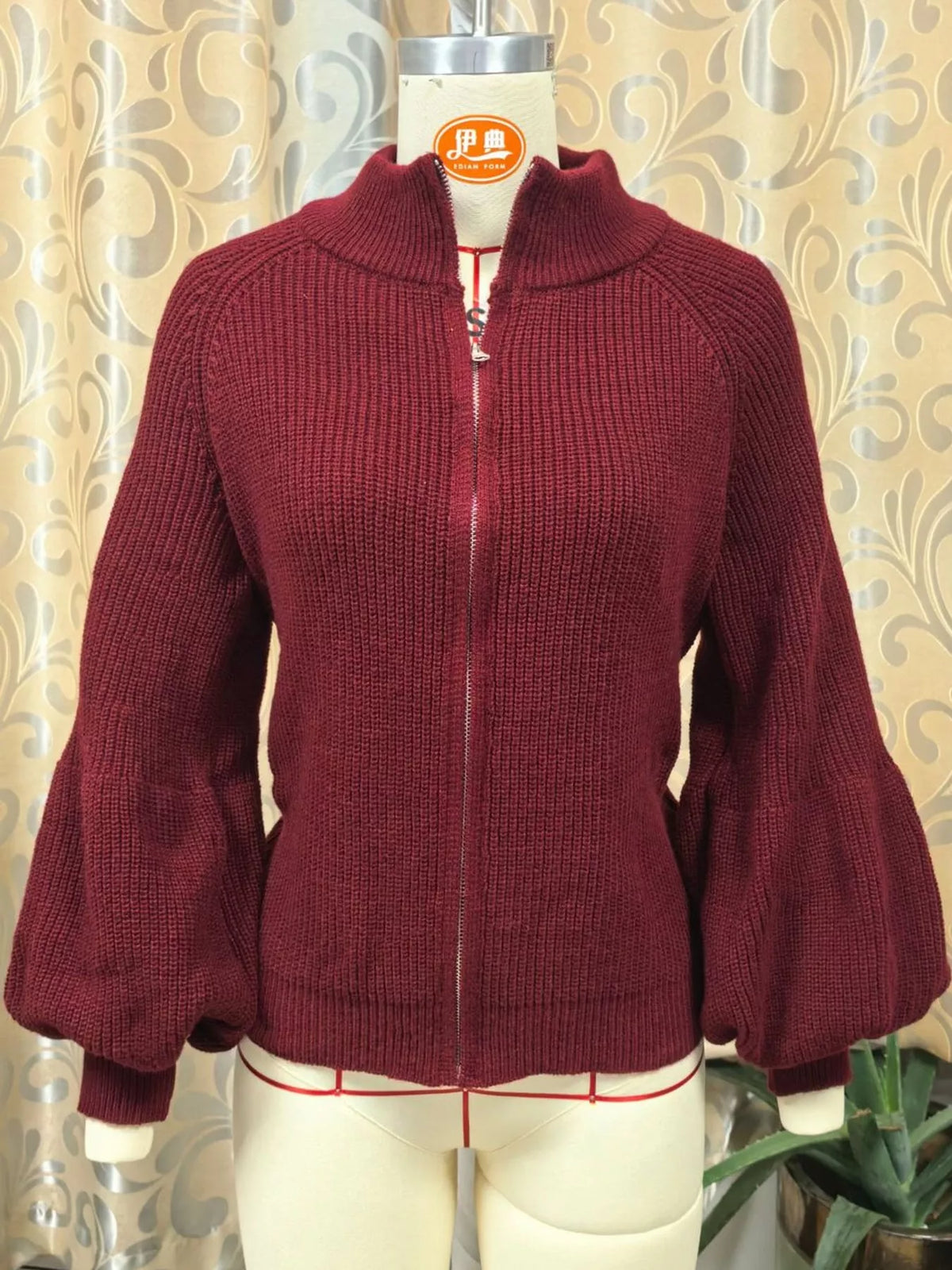Burgundy ribbed knit zip-up lantern sleeve cardigan