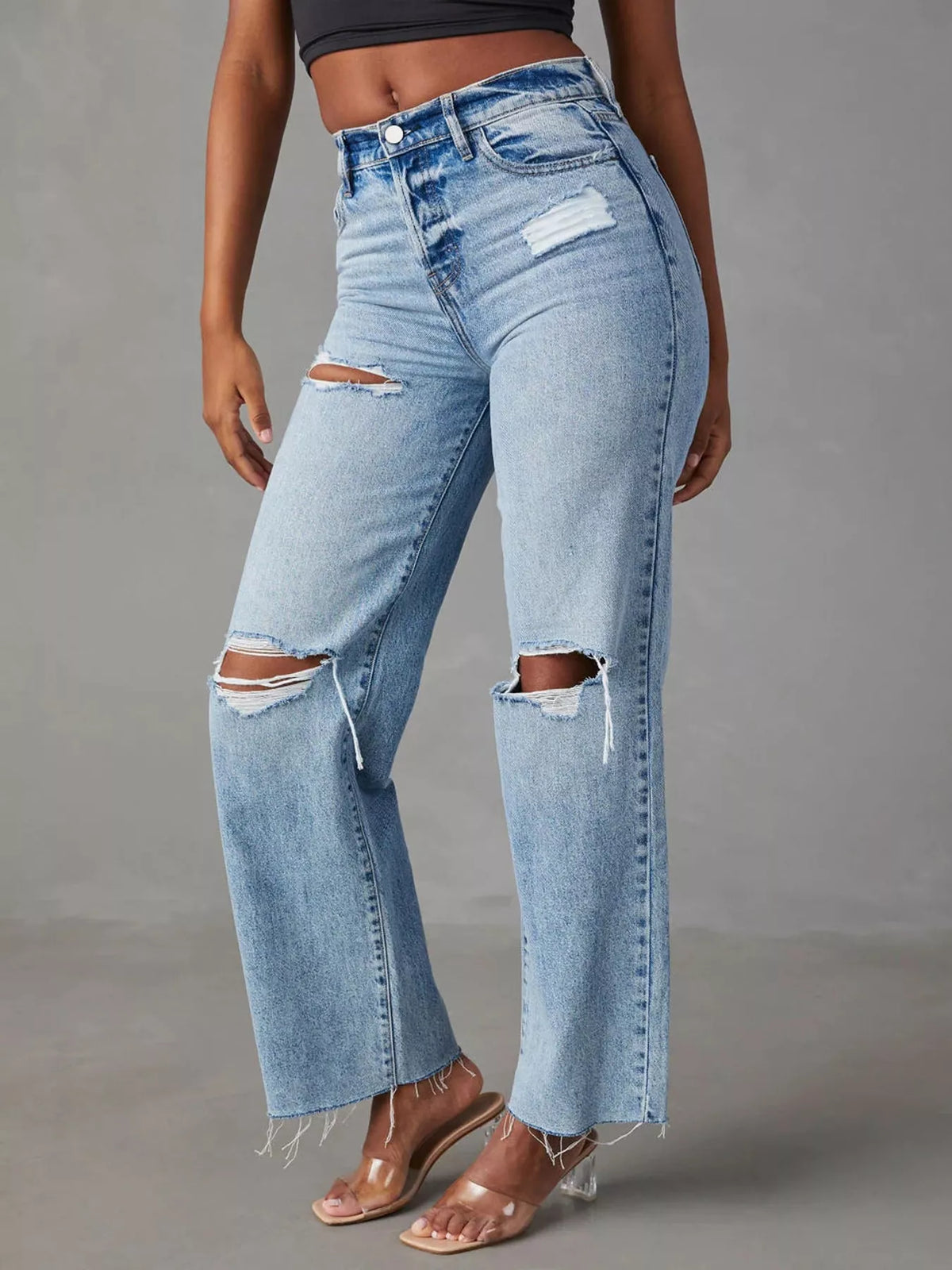 Blue high-waisted distressed jeans