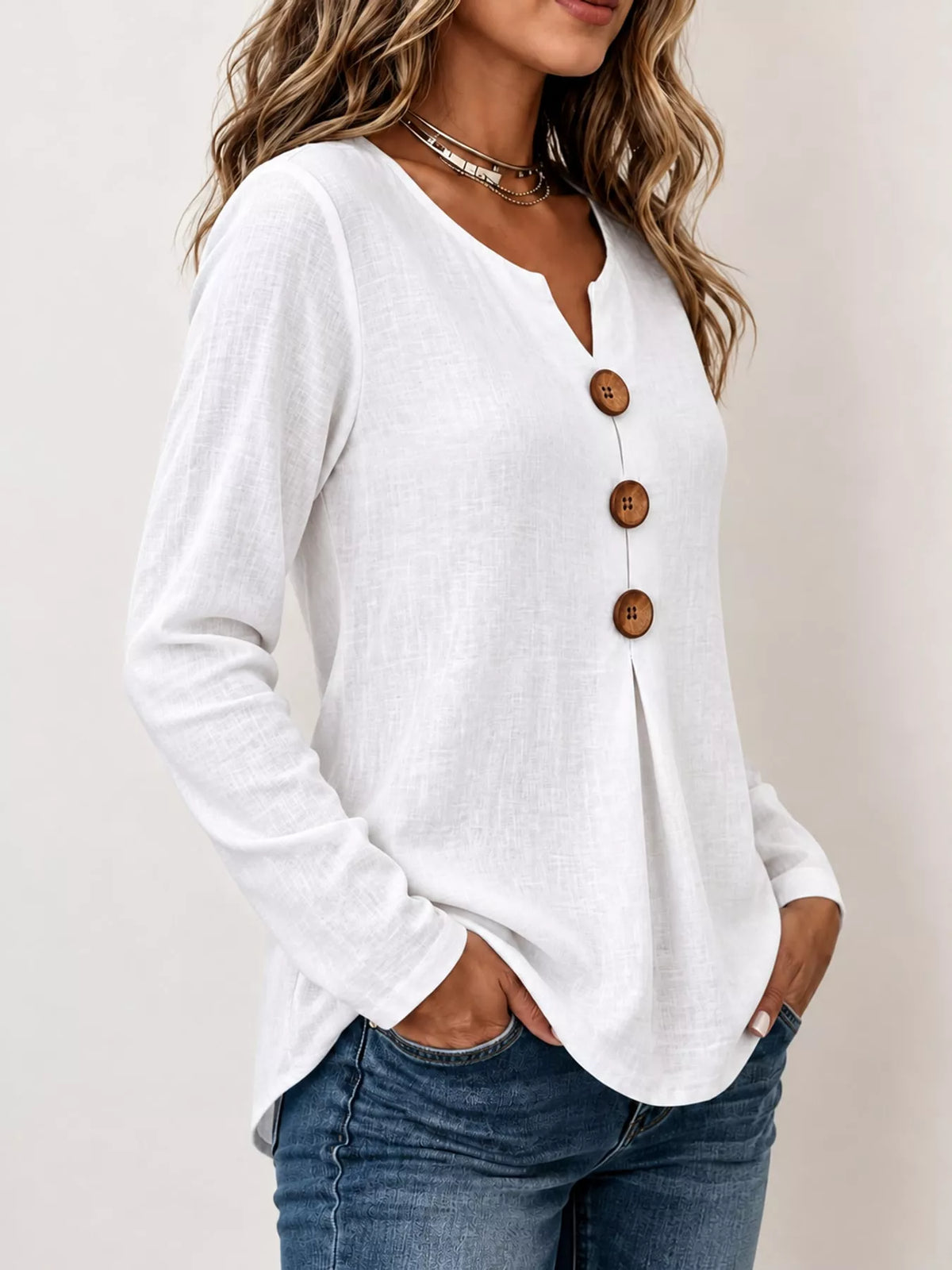 White long sleeve decorative button blouse