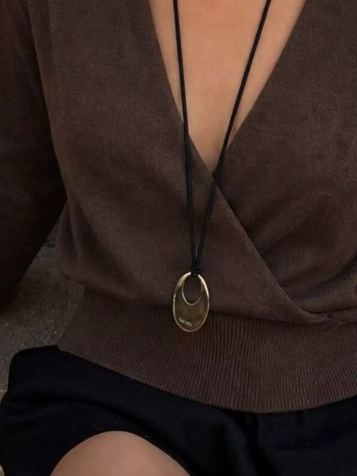 Brown wrap-front sweater, wrap front close-up