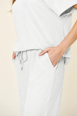 Trendsi Double Take Full Size Texture Round Neck Short Sleeve T-Shirt and Wide Leg Pants -