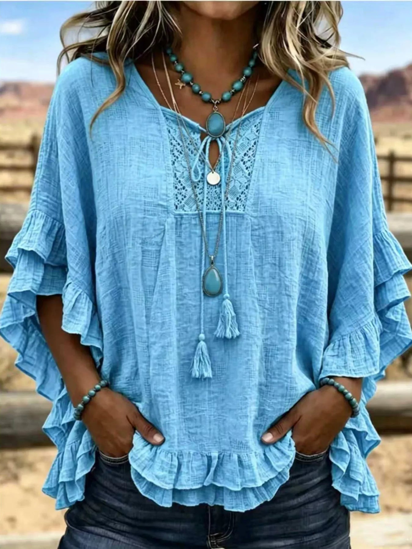 Trendsi Full Size Tassel Tie Neck Ruffled Hem Blouse Plus Size -