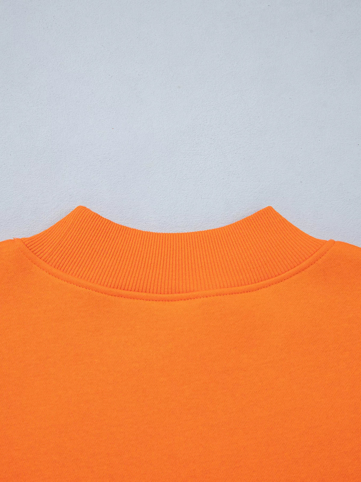 Orange gingham sleeve slogan sweatshirt, detail view