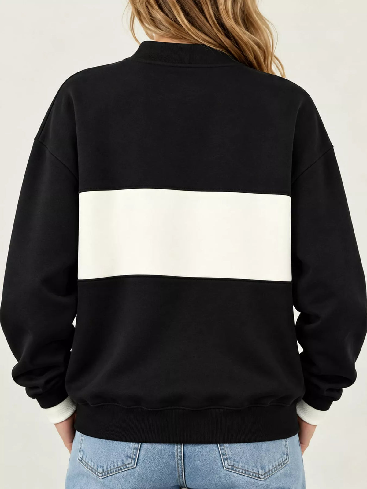 Black and cream color block snap-button sweatshirt, back view