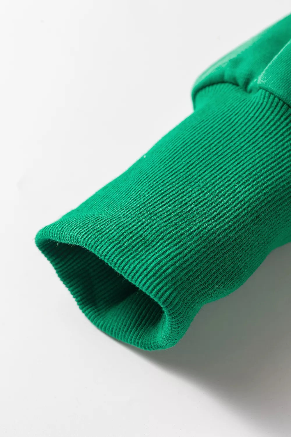 Green hooded top and wide-leg pants set, ribbed cuff detail