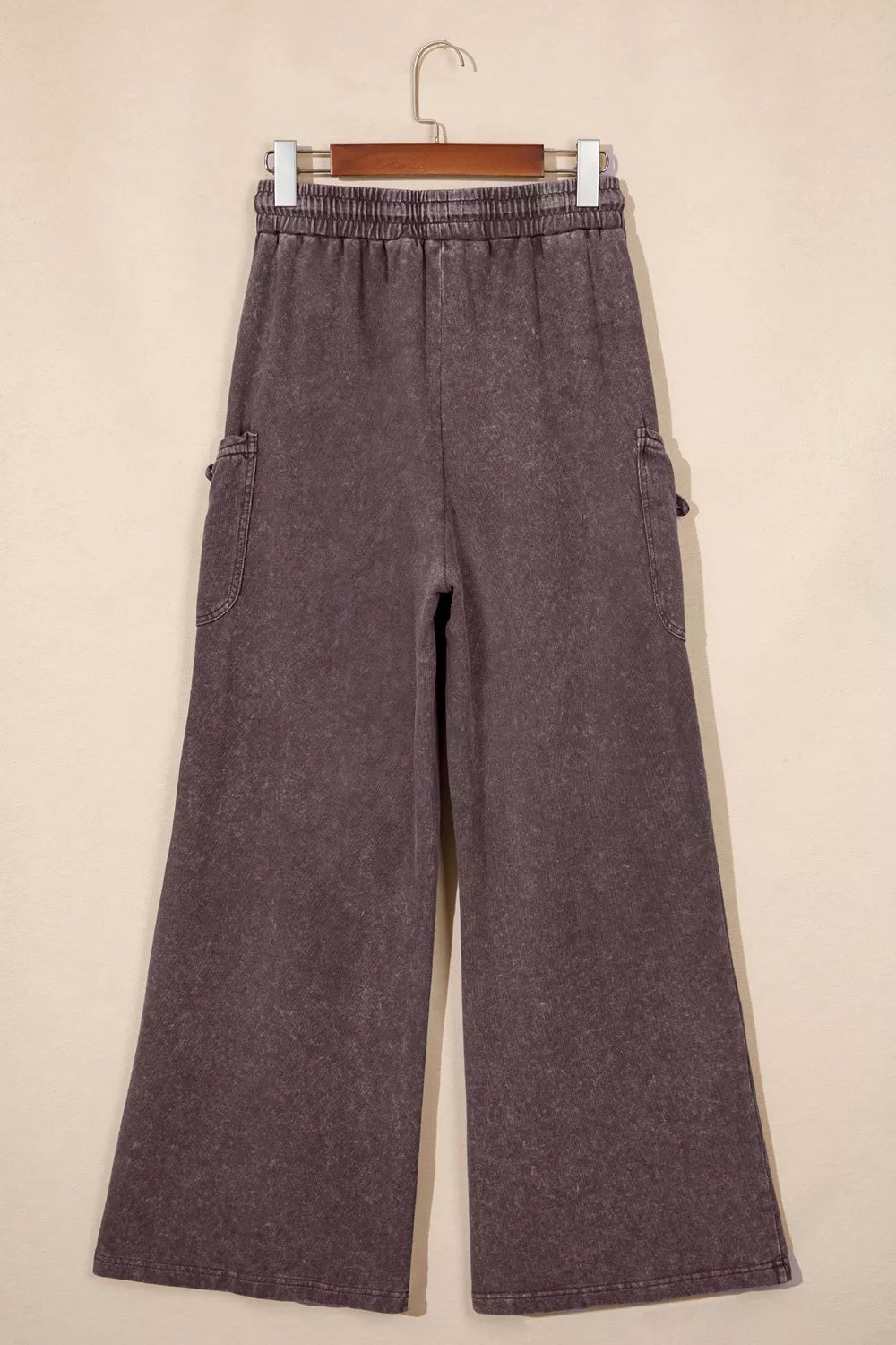 Drawstring cargo pants, hanging back