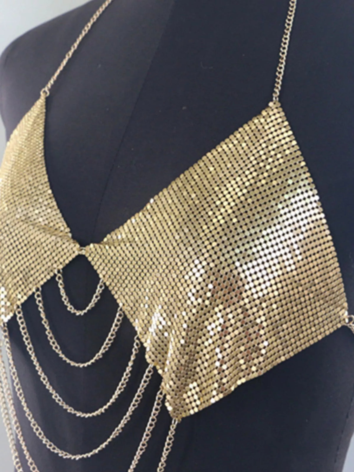 Gold metallic chainmail halter cami top, metal mesh bust panels and draped chains, side angle
