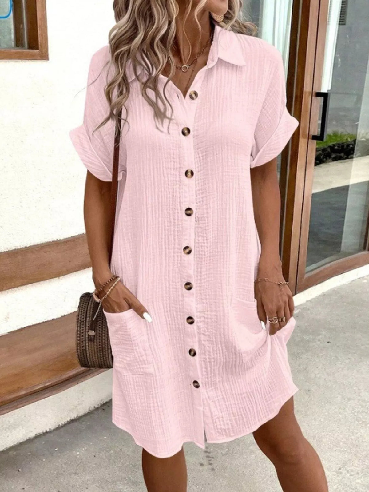 Pink textured button-front shirt dress with pockets