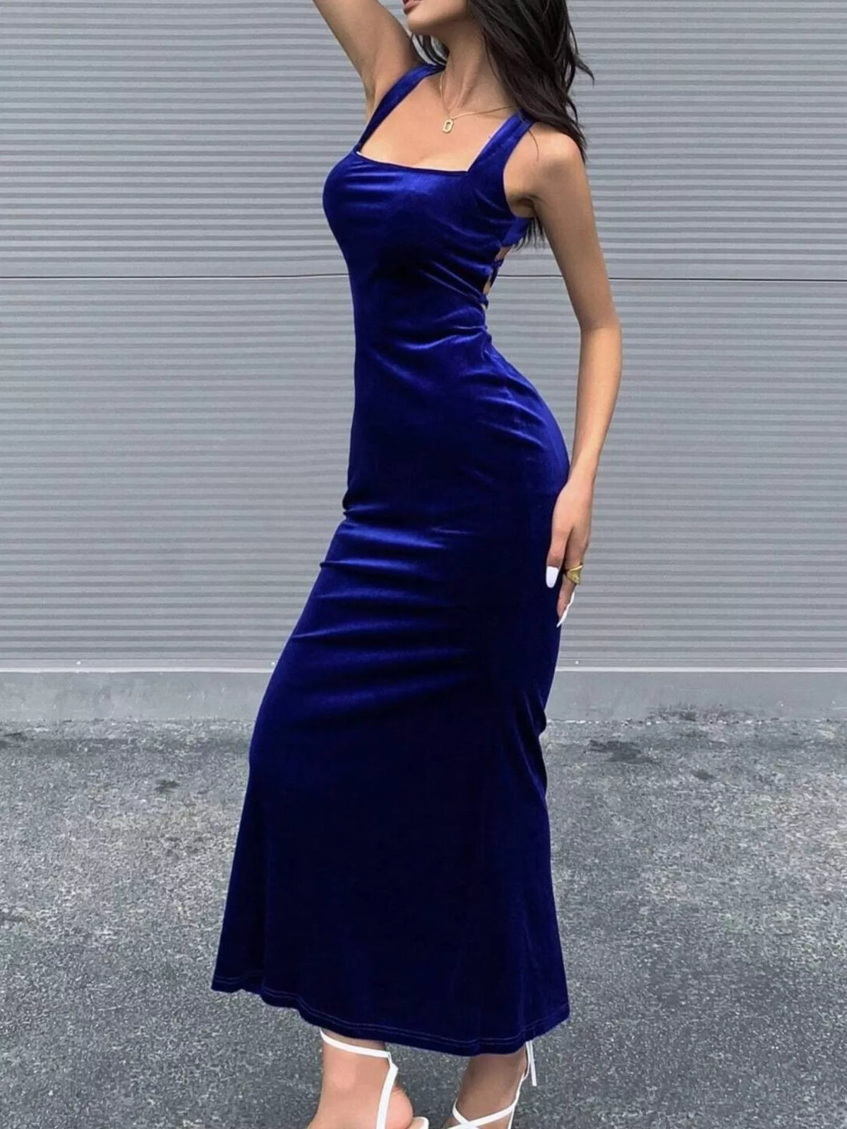 Royal blue velvet lace-up back bodycon maxi dress, angled front view.