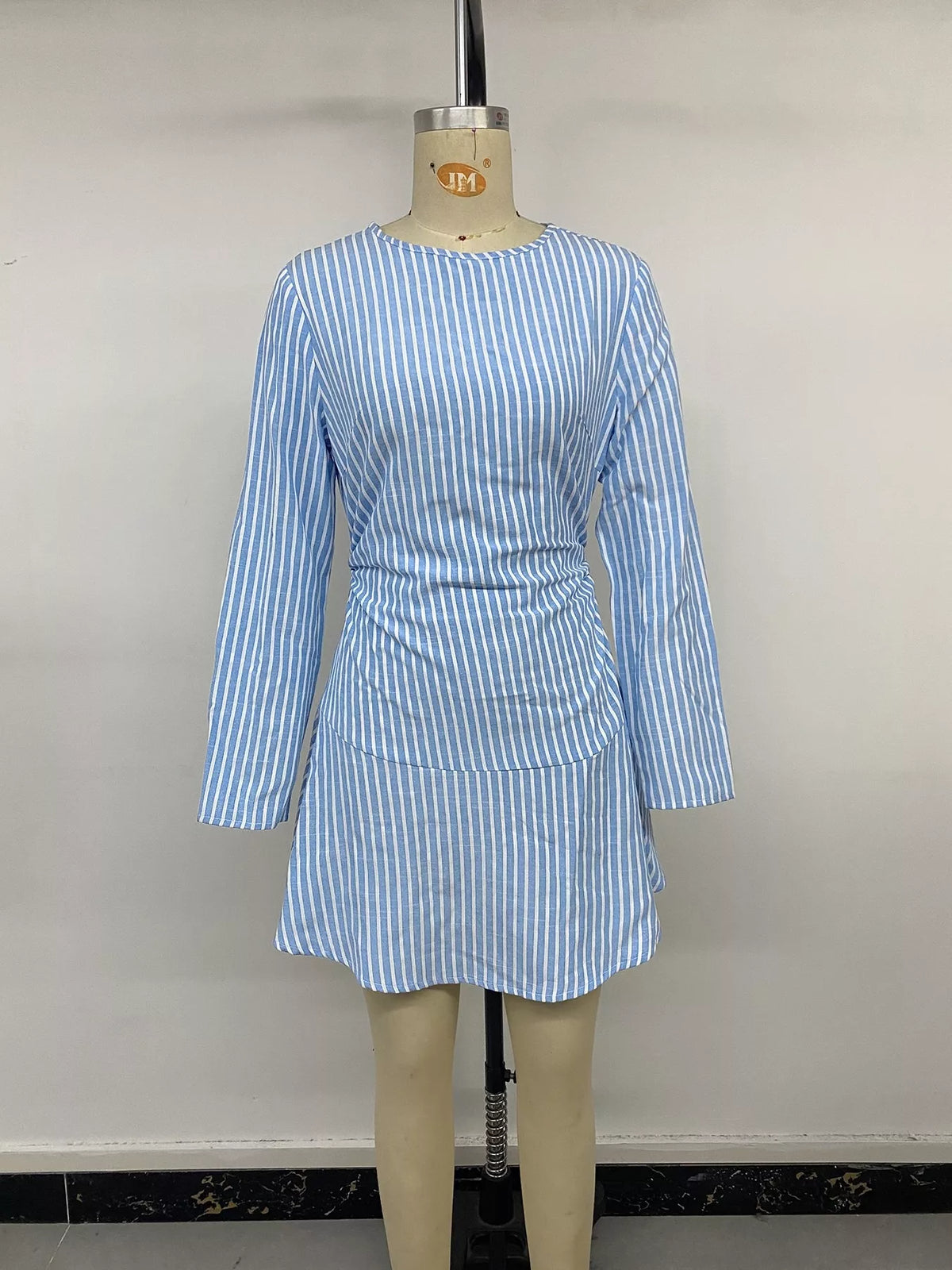 Blue striped long sleeve mini dress, front on mannequin